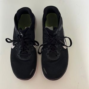 Nike Free RN running shoe Women’s size 8.5, black and white